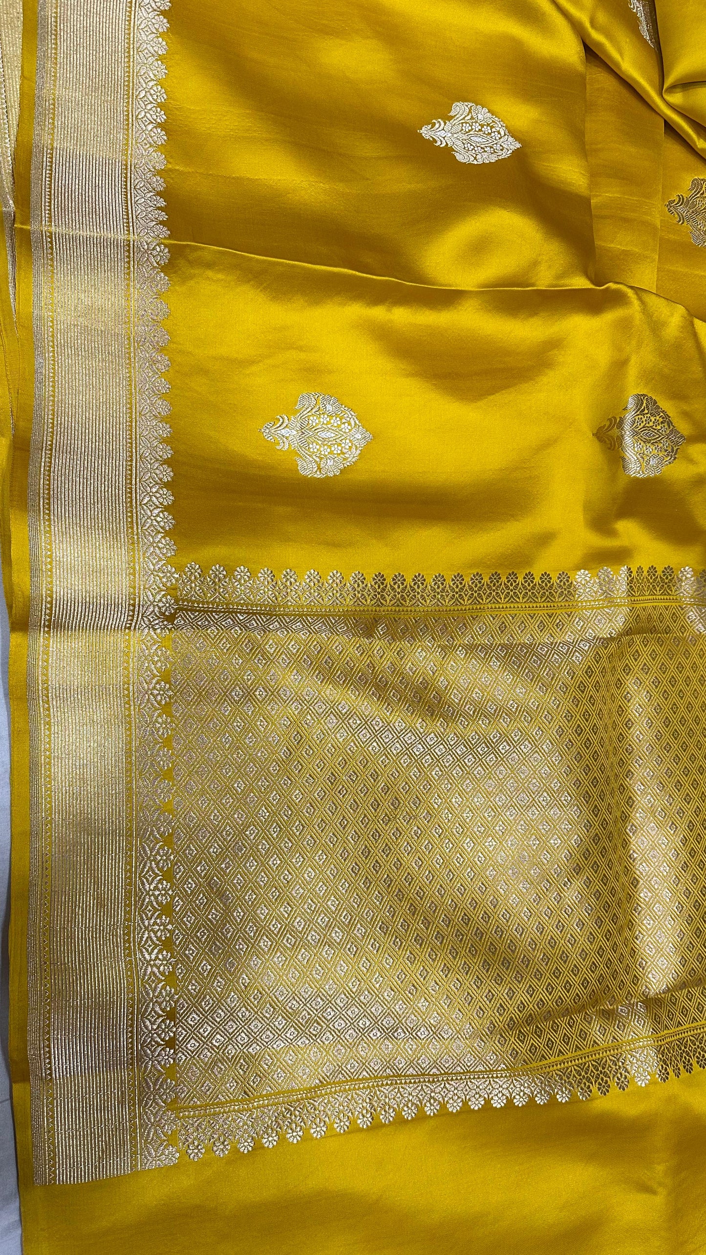 Yellow Mashru Silk Iskart Meena Border Banarasi Saree